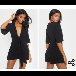 Black romper from pretty little thing